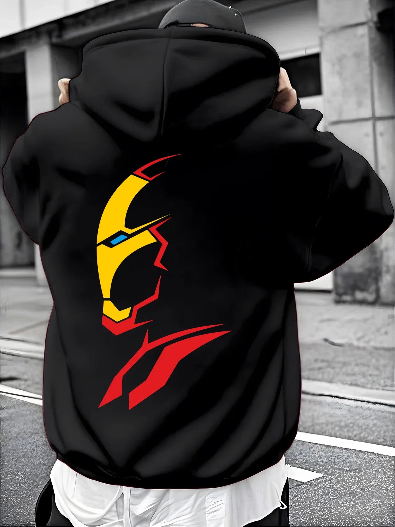 A Male Marvel Punisher with A Skull Print Effect Design Wearing A 100% Cotton Casual Hooded Sweatshirt on The Street