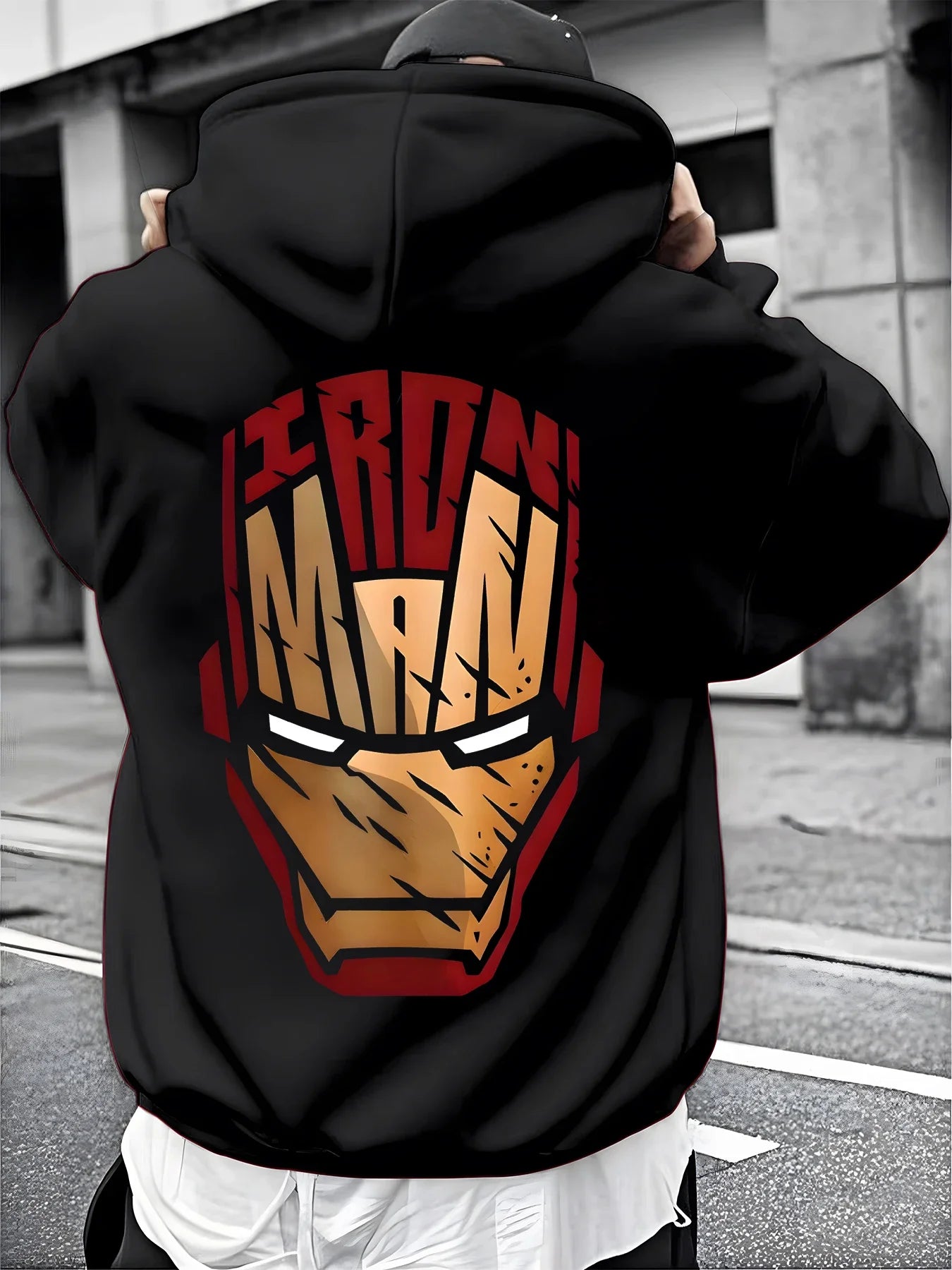 A Male Marvel Punisher with A Skull Print Effect Design Wearing A 100% Cotton Casual Hooded Sweatshirt on The Street