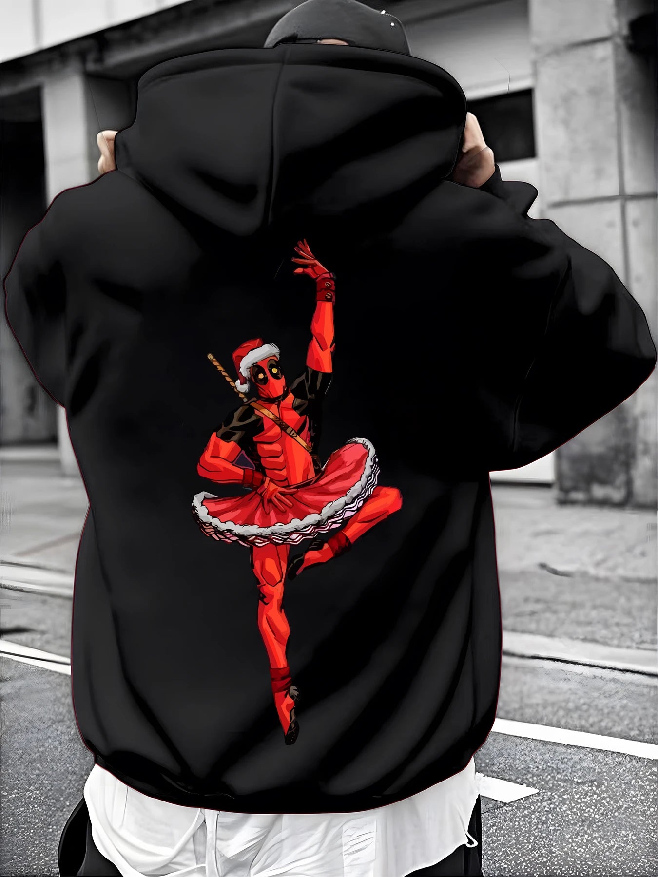 A Male Marvel Punisher with A Skull Print Effect Design Wearing A 100% Cotton Casual Hooded Sweatshirt on The Street