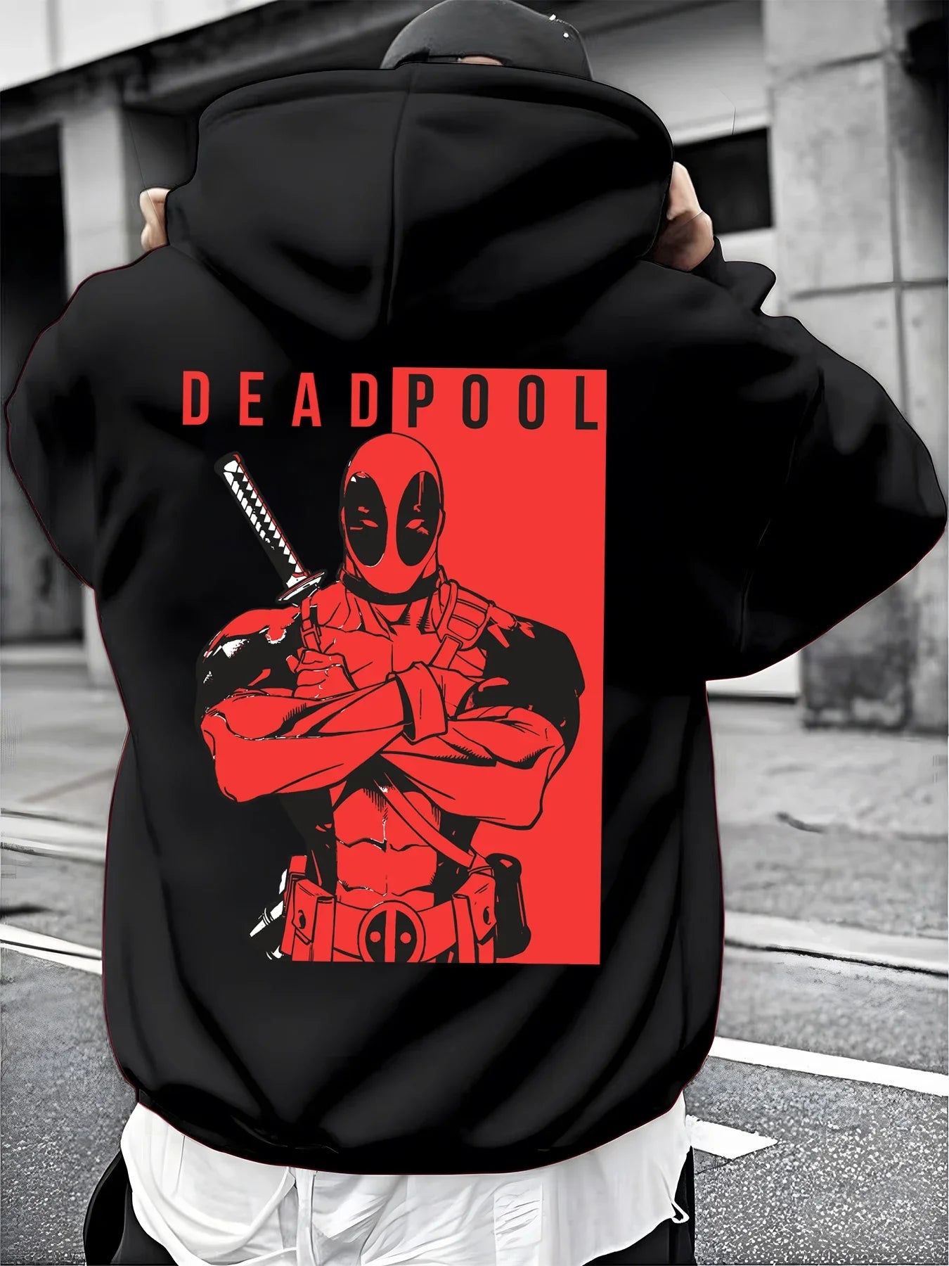 A Male Marvel Punisher with A Skull Print Effect Design Wearing A 100% Cotton Casual Hooded Sweatshirt on The Street