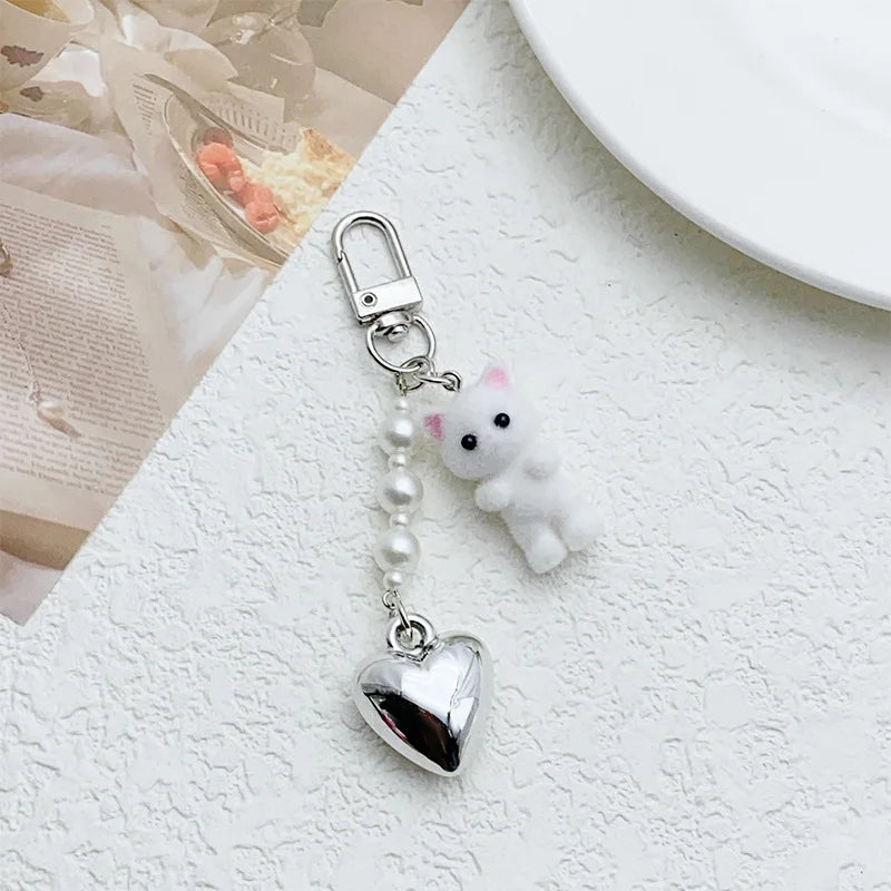 ZAKOL Cute Flocking Cat Keychain 3D Love Phone Pendant Headphone Charm Bag Decor Car Key Ring Jewelry Gift