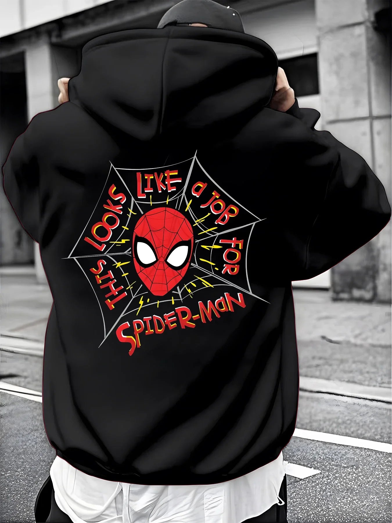 A Male Marvel Punisher with A Skull Print Effect Design Wearing A 100% Cotton Casual Hooded Sweatshirt on The Street
