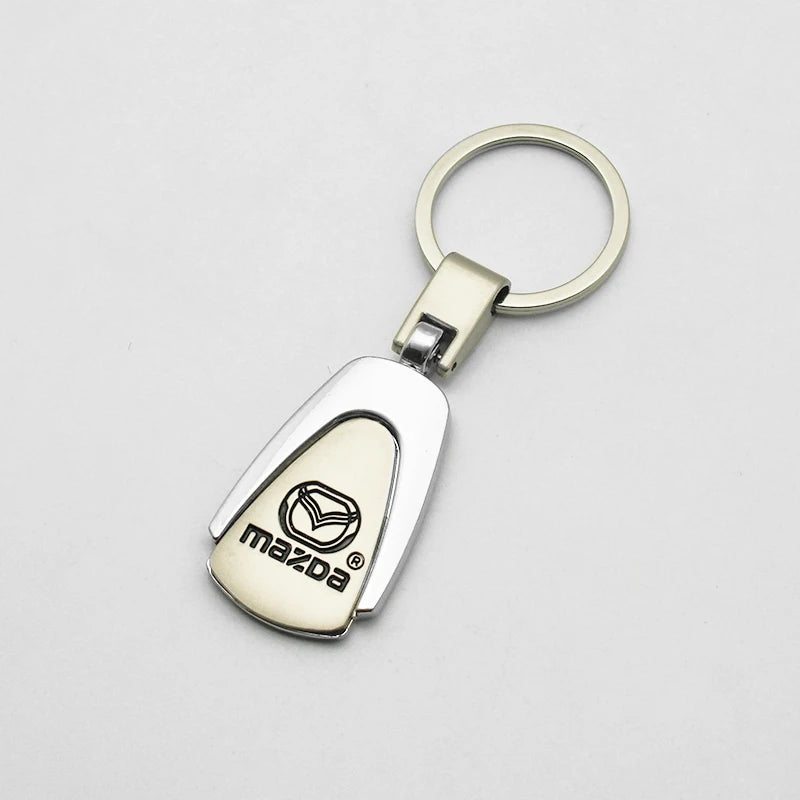Car Key Chain 3D Metal+Braided Rope Emblem Keyring For Mazda 3 2 6 CX3 CX5 CX6 CX9 MP MS CX30 Axela Demio Atenza RX7 RX8 MX3 MX5