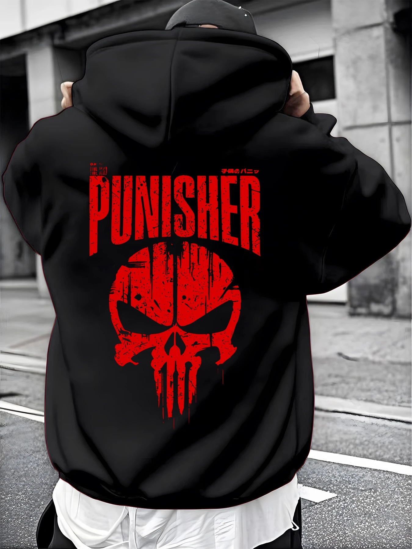A Male Marvel Punisher with A Skull Print Effect Design Wearing A 100% Cotton Casual Hooded Sweatshirt on The Street