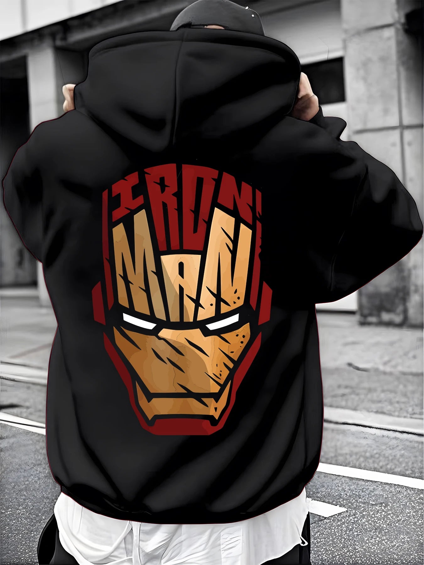 A Male Marvel Punisher with A Skull Print Effect Design Wearing A 100% Cotton Casual Hooded Sweatshirt on The Street