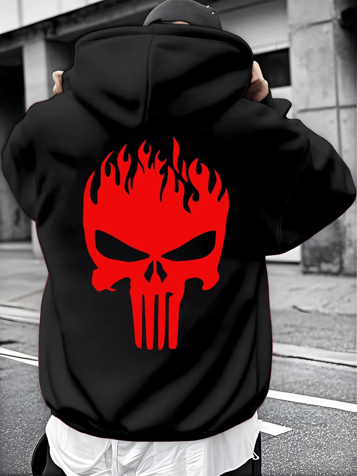 A Male Marvel Punisher with A Skull Print Effect Design Wearing A 100% Cotton Casual Hooded Sweatshirt on The Street