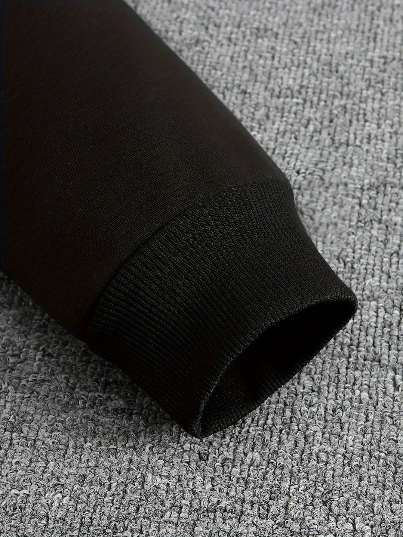 A Male Marvel Punisher with A Skull Print Effect Design Wearing A 100% Cotton Casual Hooded Sweatshirt on The Street