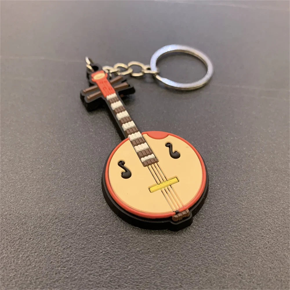 Cute Guitar Violin Piano Saxophone Keychains PVC Soft Rubber Cartoon Musical Instrument Keyring Car Backpack Pendant Accessories