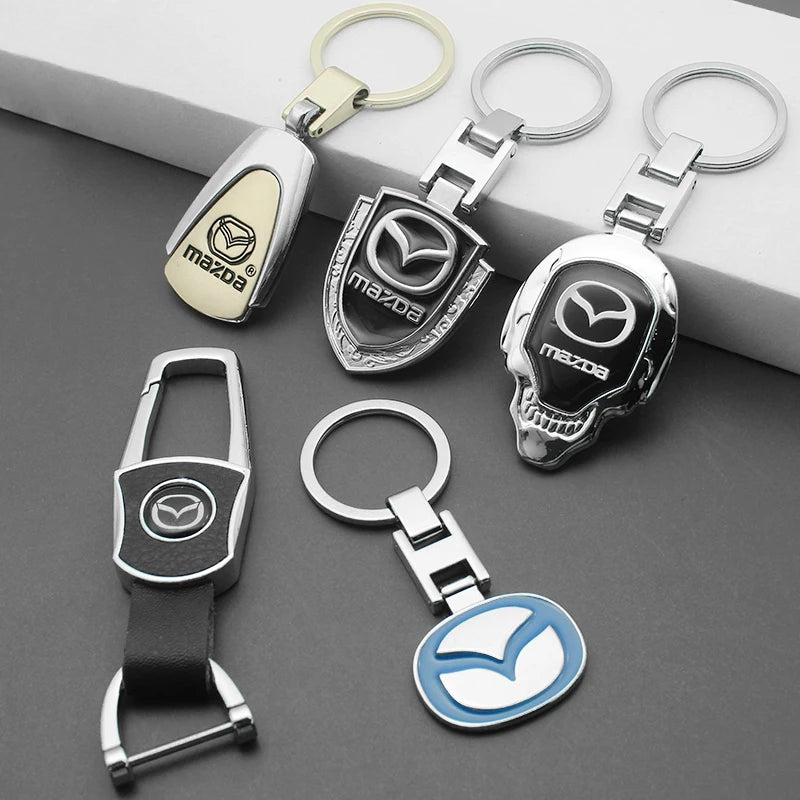 Car Key Chain 3D Metal+Braided Rope Emblem Keyring For Mazda 3 2 6 CX3 CX5 CX6 CX9 MP MS CX30 Axela Demio Atenza RX7 RX8 MX3 MX5
